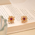 Traditional Star Shaped Ruby Golden Studs