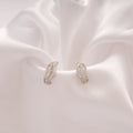 Stylish Curved Leaf Pattern Silver Stud