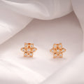Beautiful Flower with Golden Cubic Stones Studs