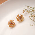 Heritage Flower Ruby White Stone Golden Stud