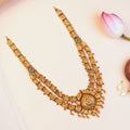Silver Double Layer Peacock Temple Haram with Lakshmi Motifs and Gold Ball Drops