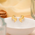Sculptural Gold Wave Design Stud