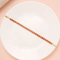Elite Oval Shape Ruby Stone Gold Bracelet