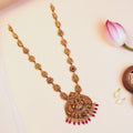 Silver Lakshmi Temple Haram with Peacock Pendant, Ruby-Red Stones and Pearl Drops