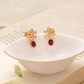 Oval Ruby Drop Snowflake Design Golden Earring
