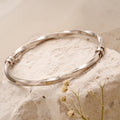 Modern Glossy Silver Twisted Bracelet