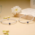 Curved Flower Design Silver Bangle