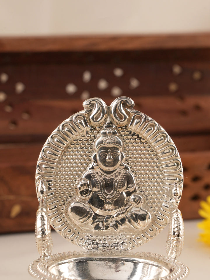 The Shape of Kubera in Silver Vilakku