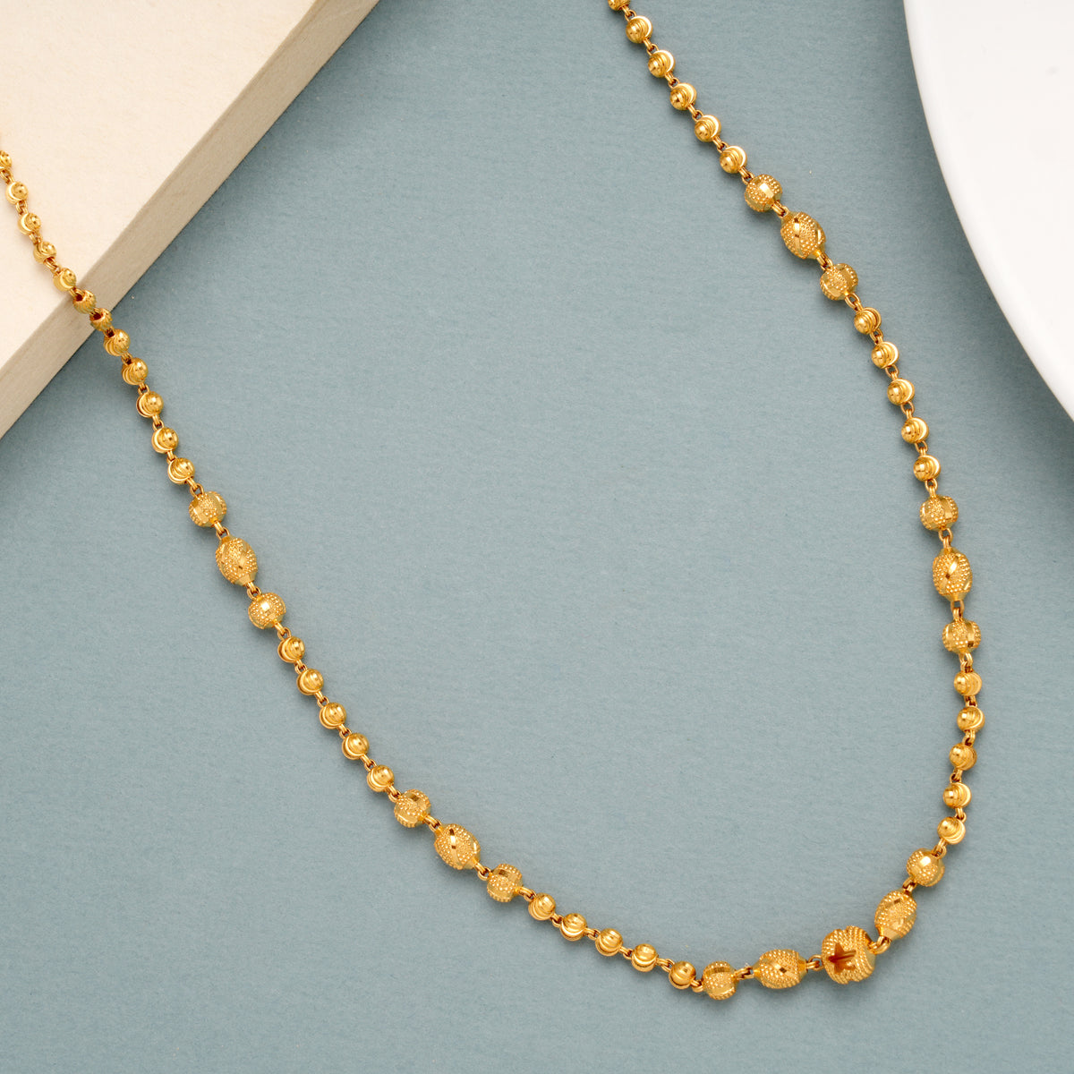 Sleek Gold Ball Pattern Chain