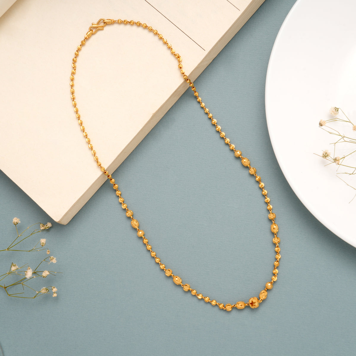 Sleek Gold Ball Pattern Chain