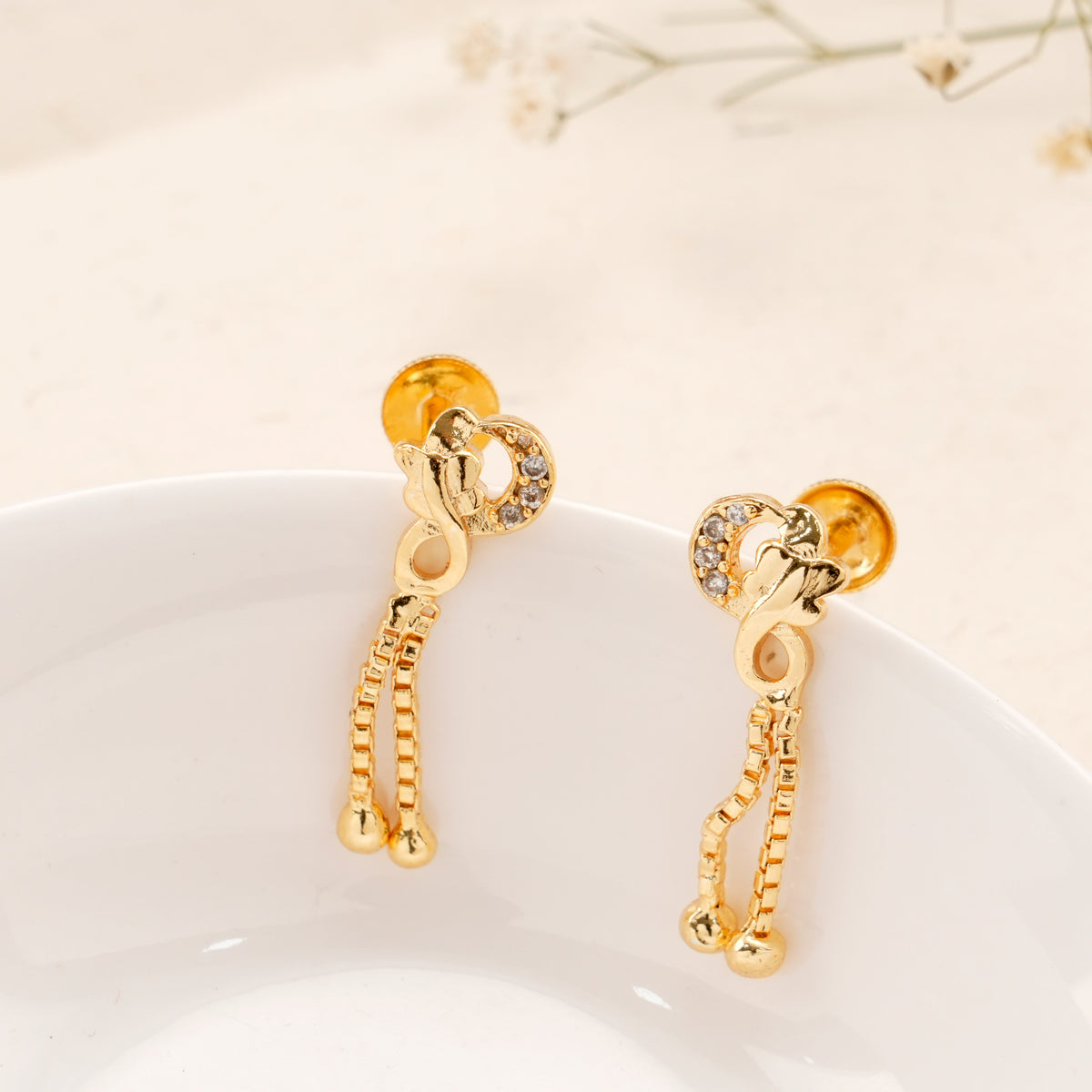 Fancy Infinity White Stone Golden Earring