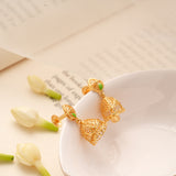 Dangling Bell Shaped Drop Golden Jhumkas