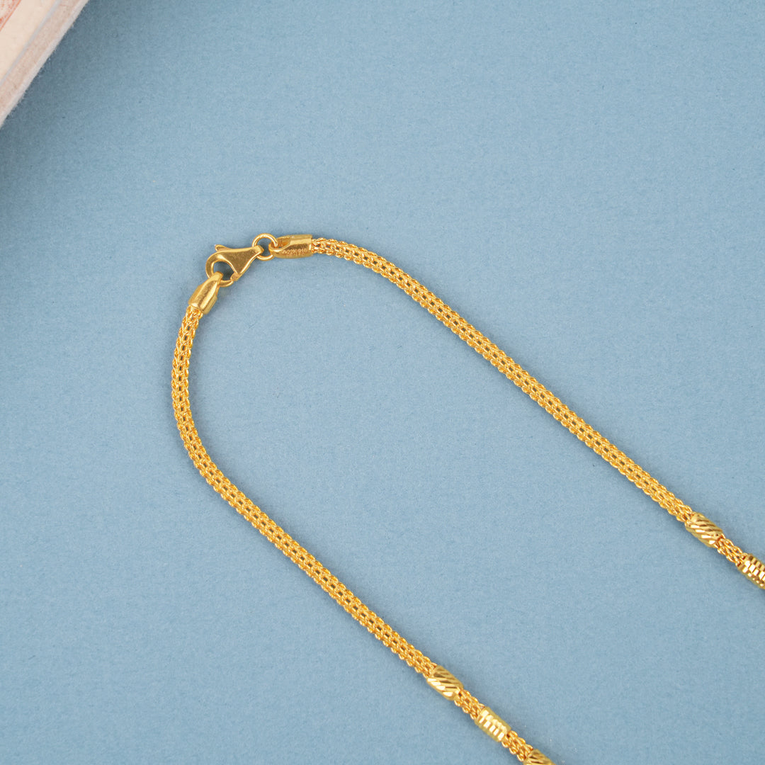 Elegant Gold Textured Leaf Bead Necklace
