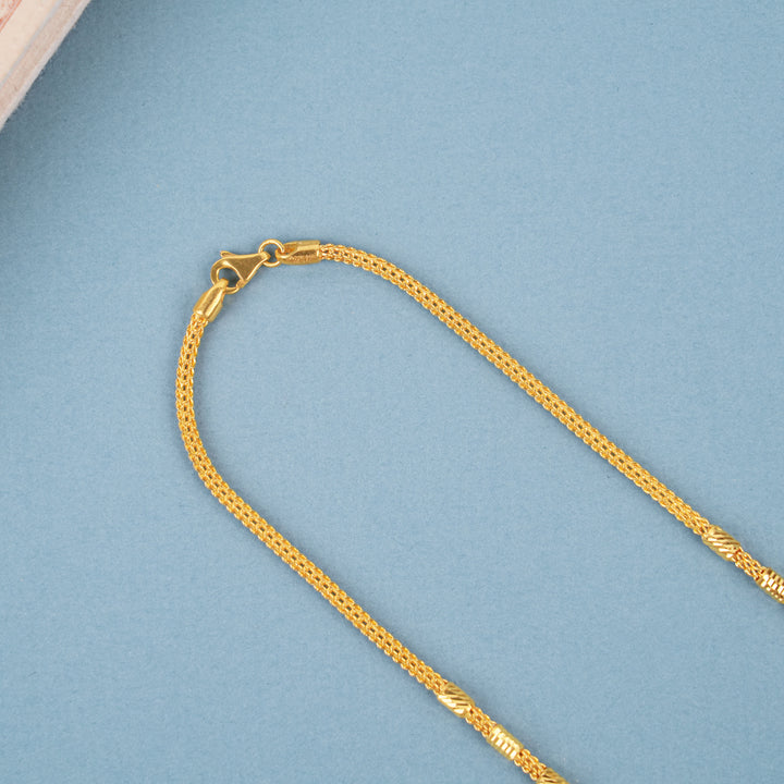 Elegant Gold Textured Leaf Bead Necklace
