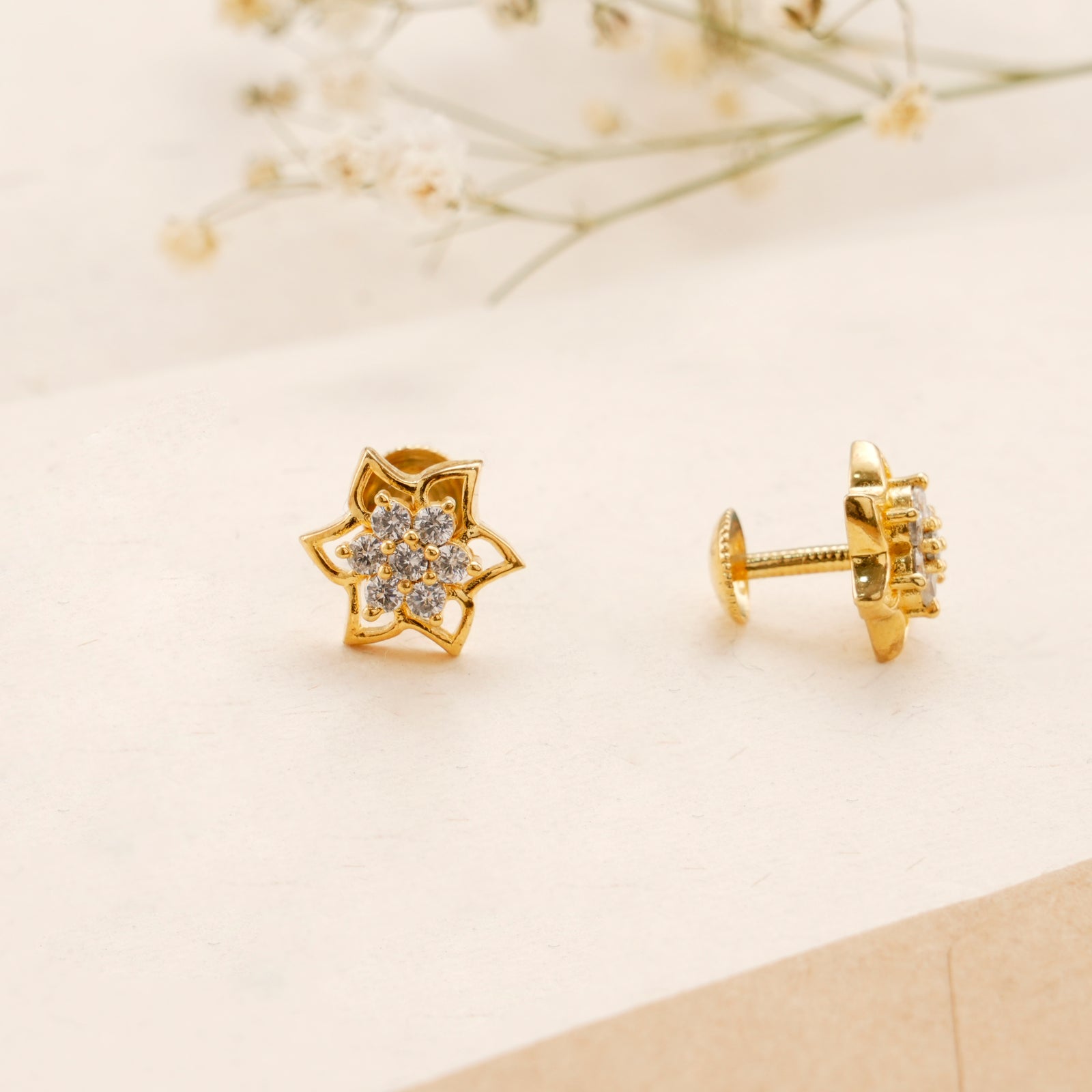Twinkling Floral Casting Golden Kundan Stud