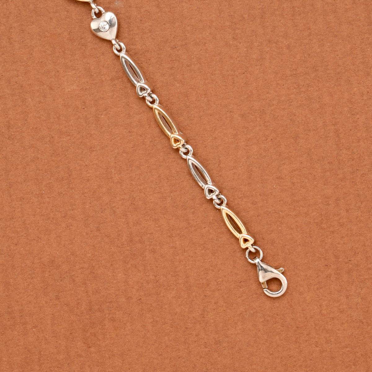 Stylish Dual Tone Heart Charms Silver Bracelet