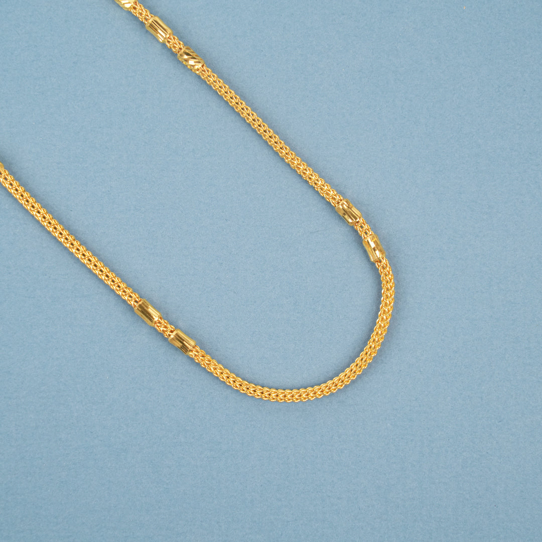 Elegant Gold Textured Leaf Bead Necklace