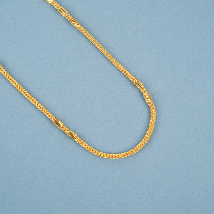 Elegant Gold Textured Leaf Bead Necklace