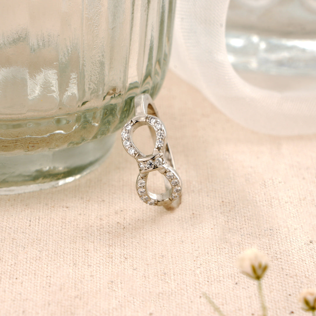 Infinity Design with White Stone Ring