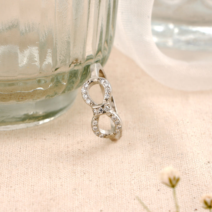 Infinity Design with White Stone Ring