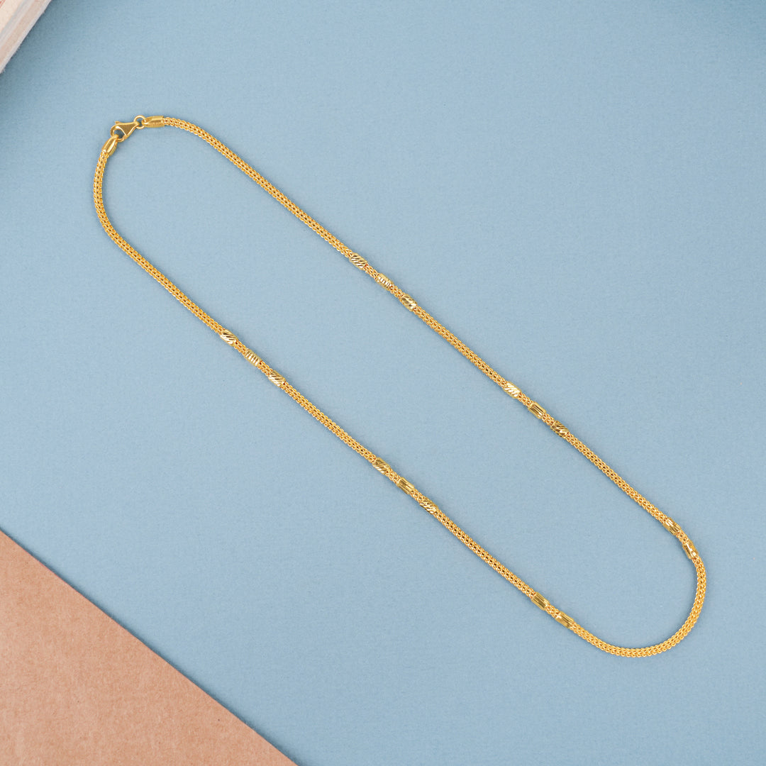 Elegant Gold Textured Leaf Bead Necklace