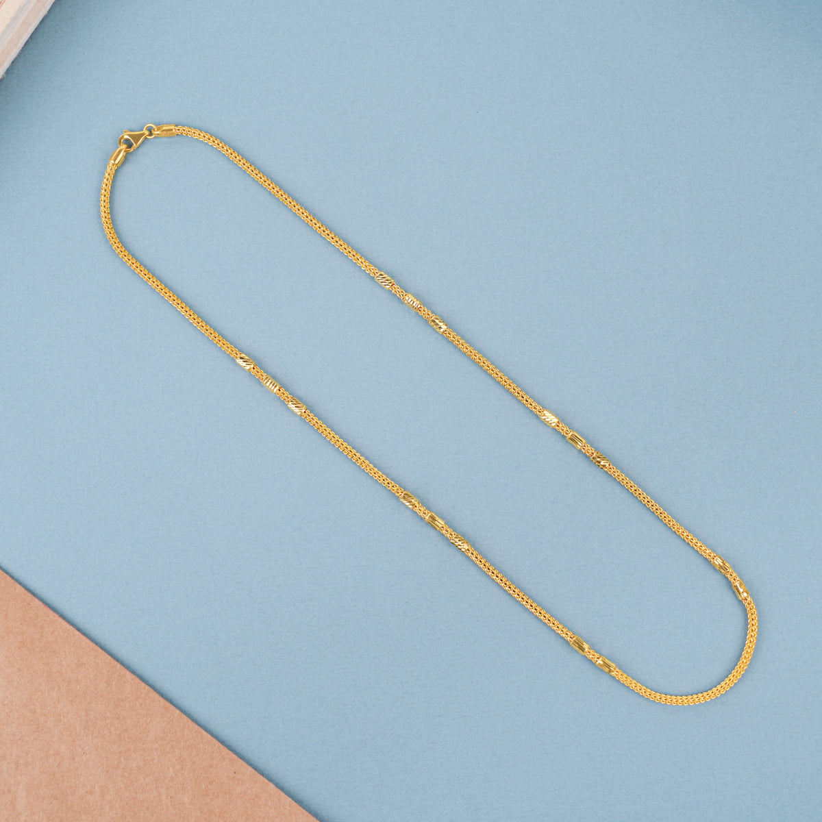 Elegant Gold Textured Leaf Bead Necklace