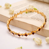 Square Shaped Ruby Stone with Golden Bangle