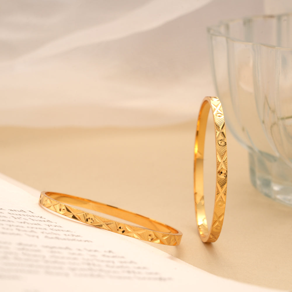 Ethnic Gold Plated Cross Cut Bangles