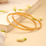 Intricate Wave Pattern Gold Plated Bangle