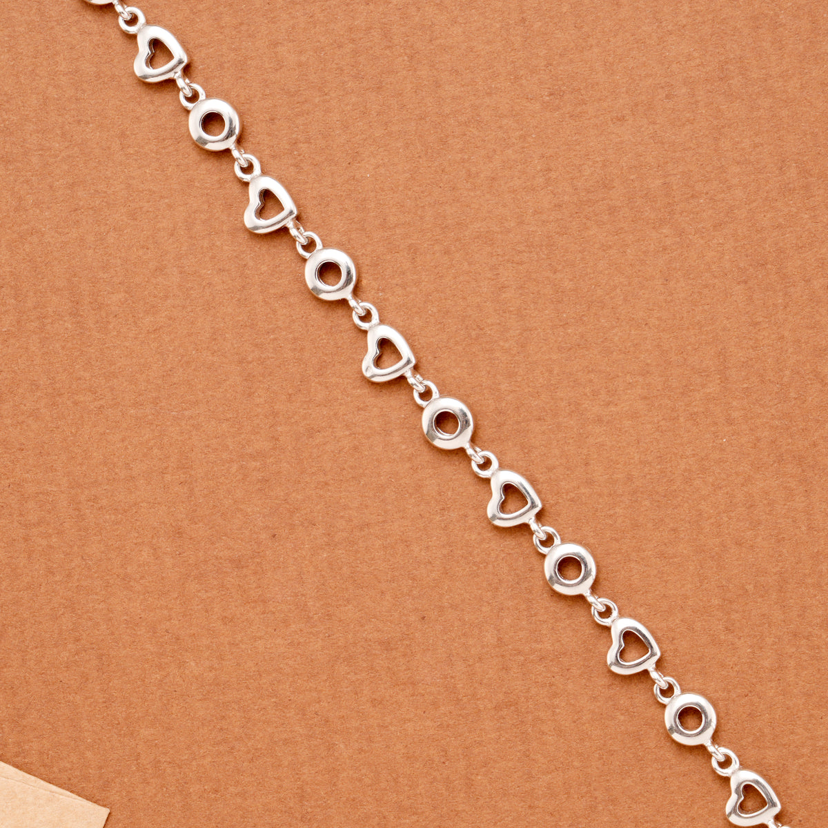 Elegant Hollow Heart Motif Silver Link Bracelet