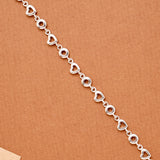Elegant Hollow Heart Motif Silver Link Bracelet