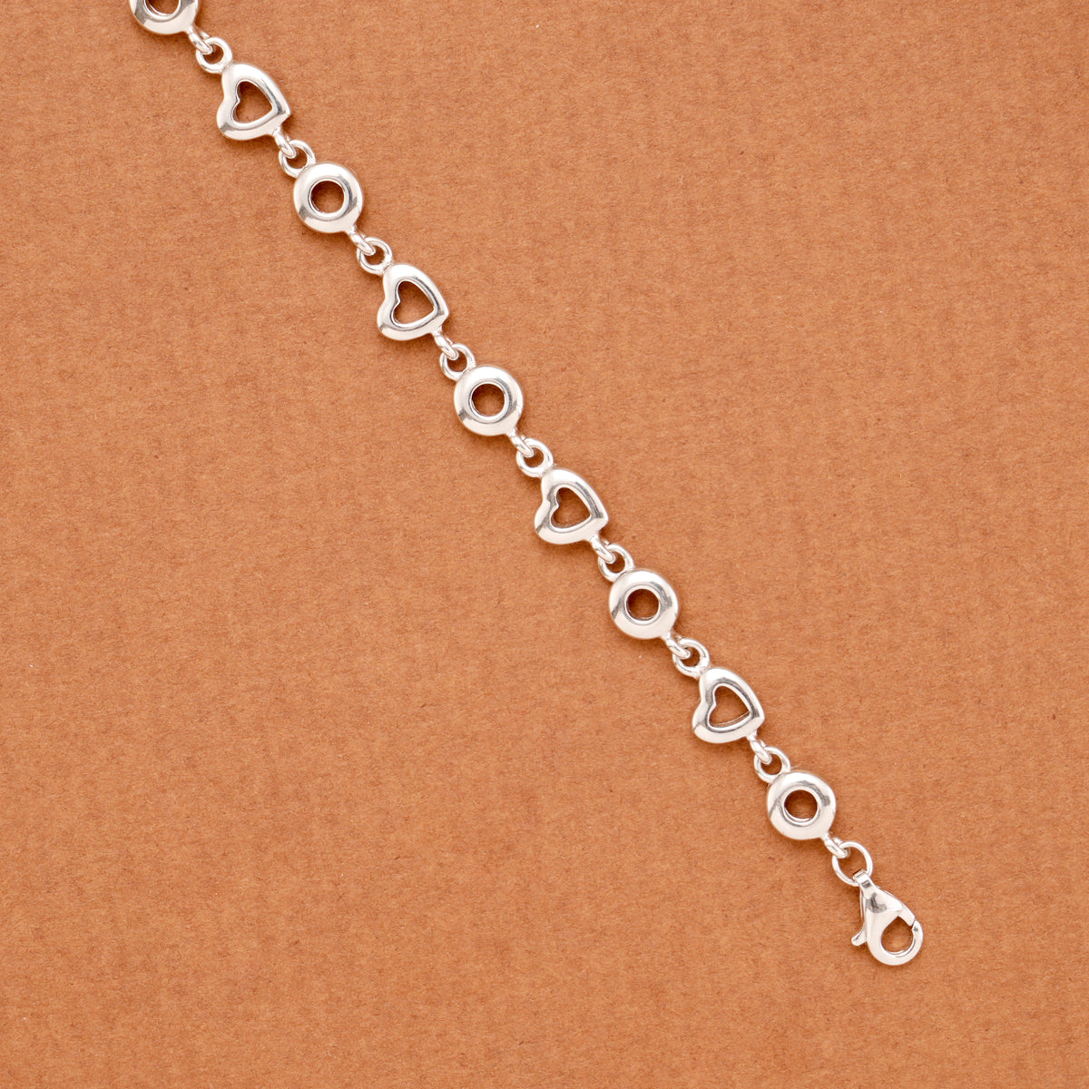Elegant Hollow Heart Motif Silver Link Bracelet