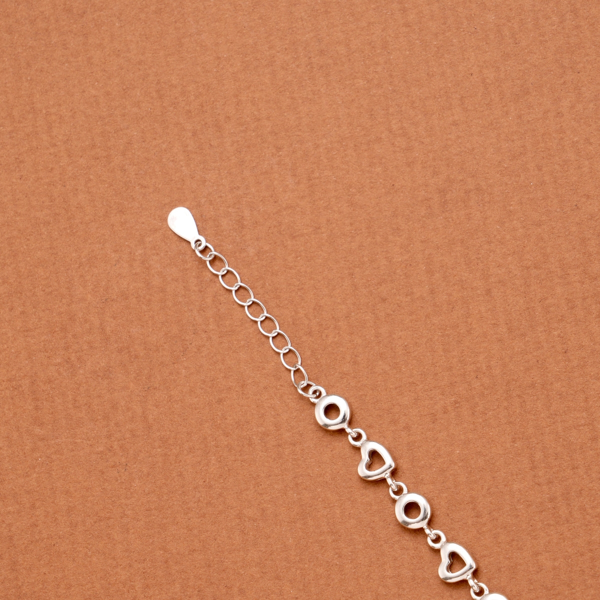 Elegant Hollow Heart Motif Silver Link Bracelet
