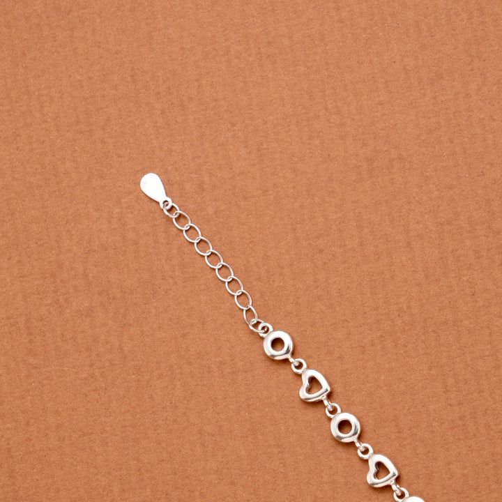 Elegant Hollow Heart Motif Silver Link Bracelet