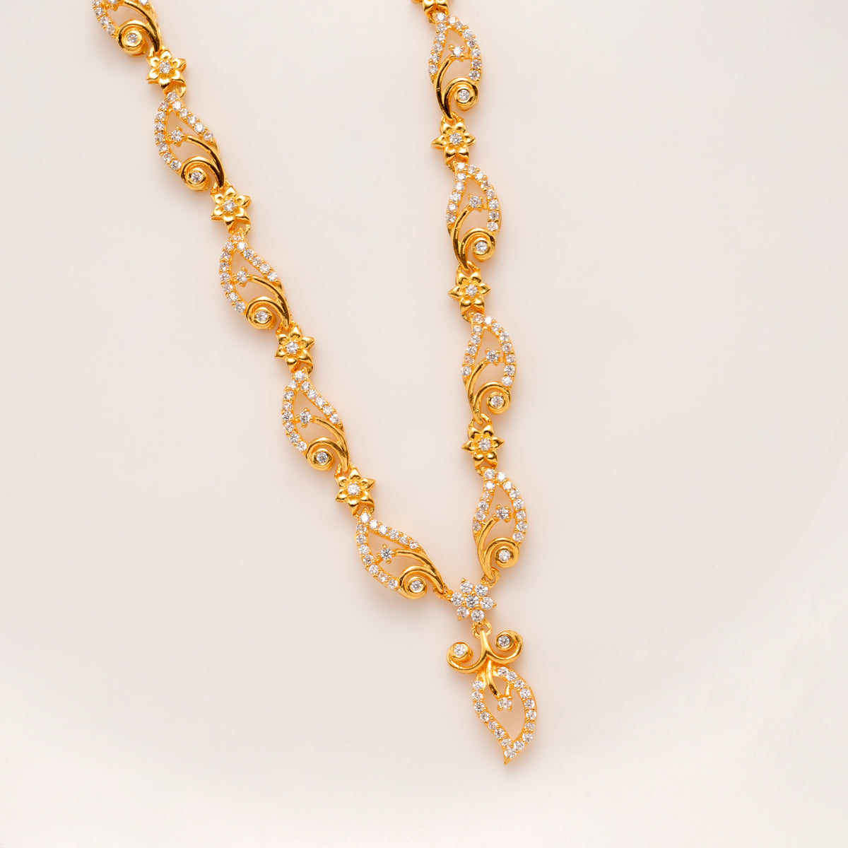 Sparkling Floral White Stone Golden Necklace Set