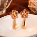 Gold Blossom Earrings with Teardrop Danglers