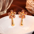Gold Floral Earrings with Teardrop Danglers