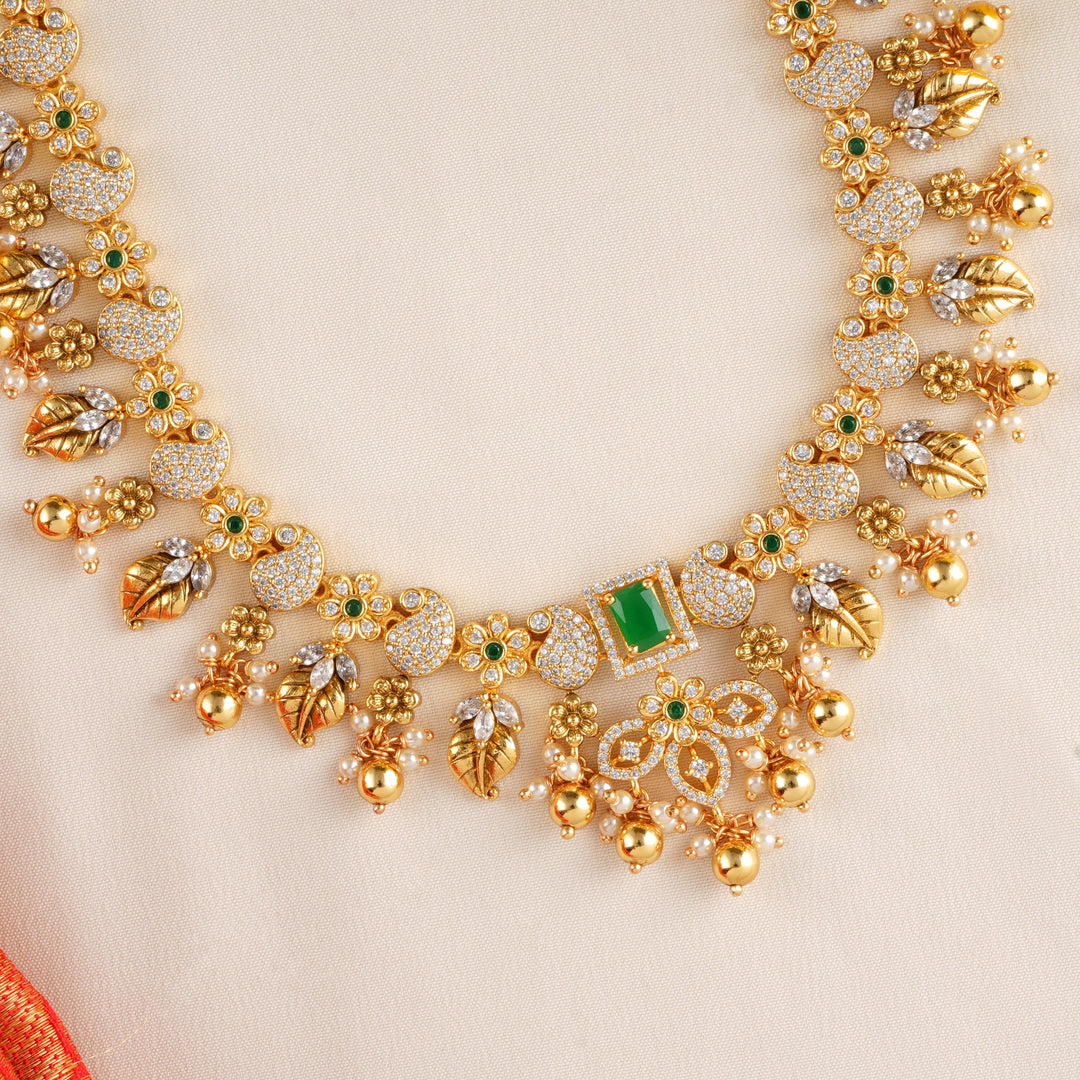 Stylish Emerald Halo with Gold Balls Necklace