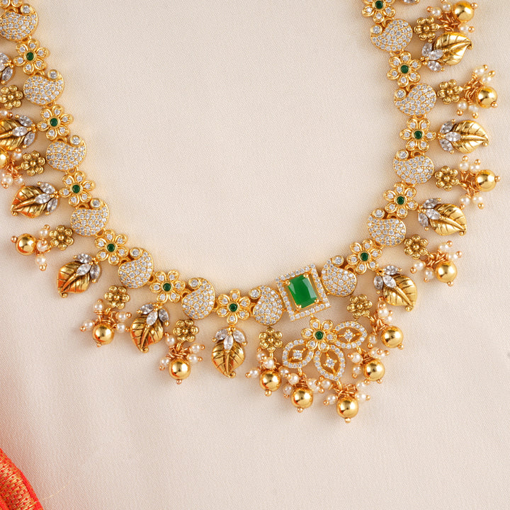 Stylish Emerald Halo with Gold Balls Necklace