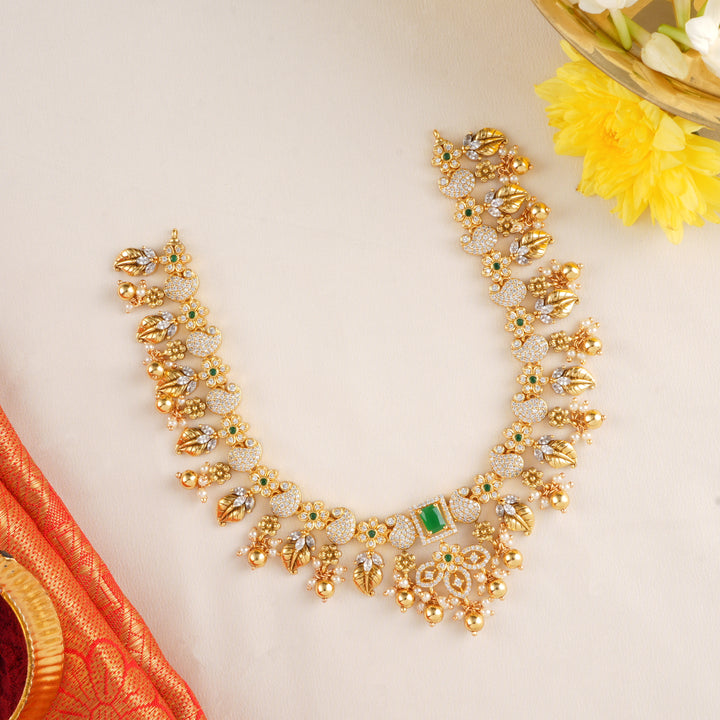 Stylish Emerald Halo with Gold Balls Necklace