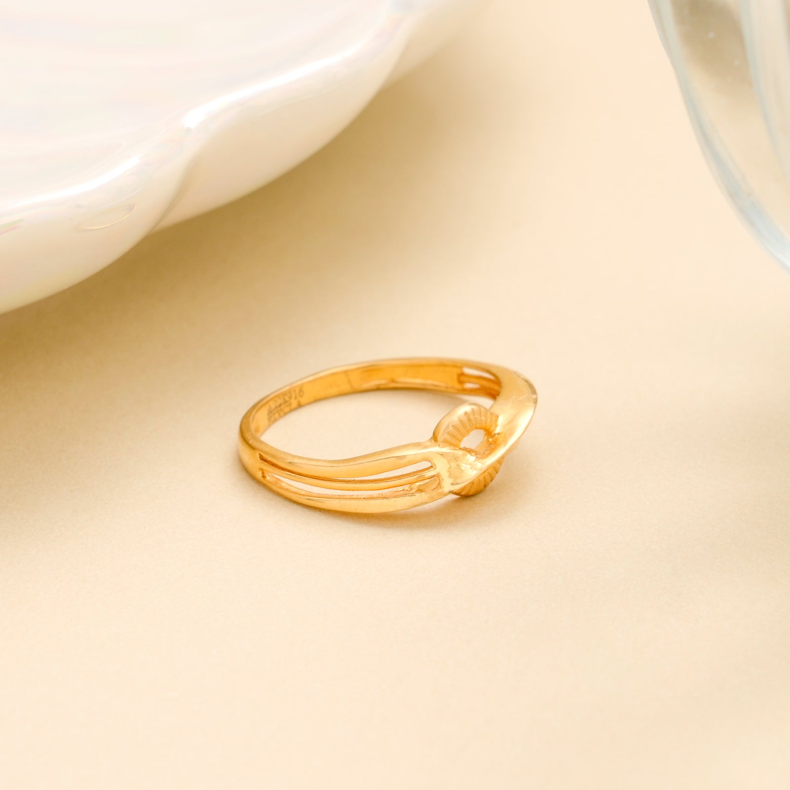 Elegant Minimal Twist Gold Ring