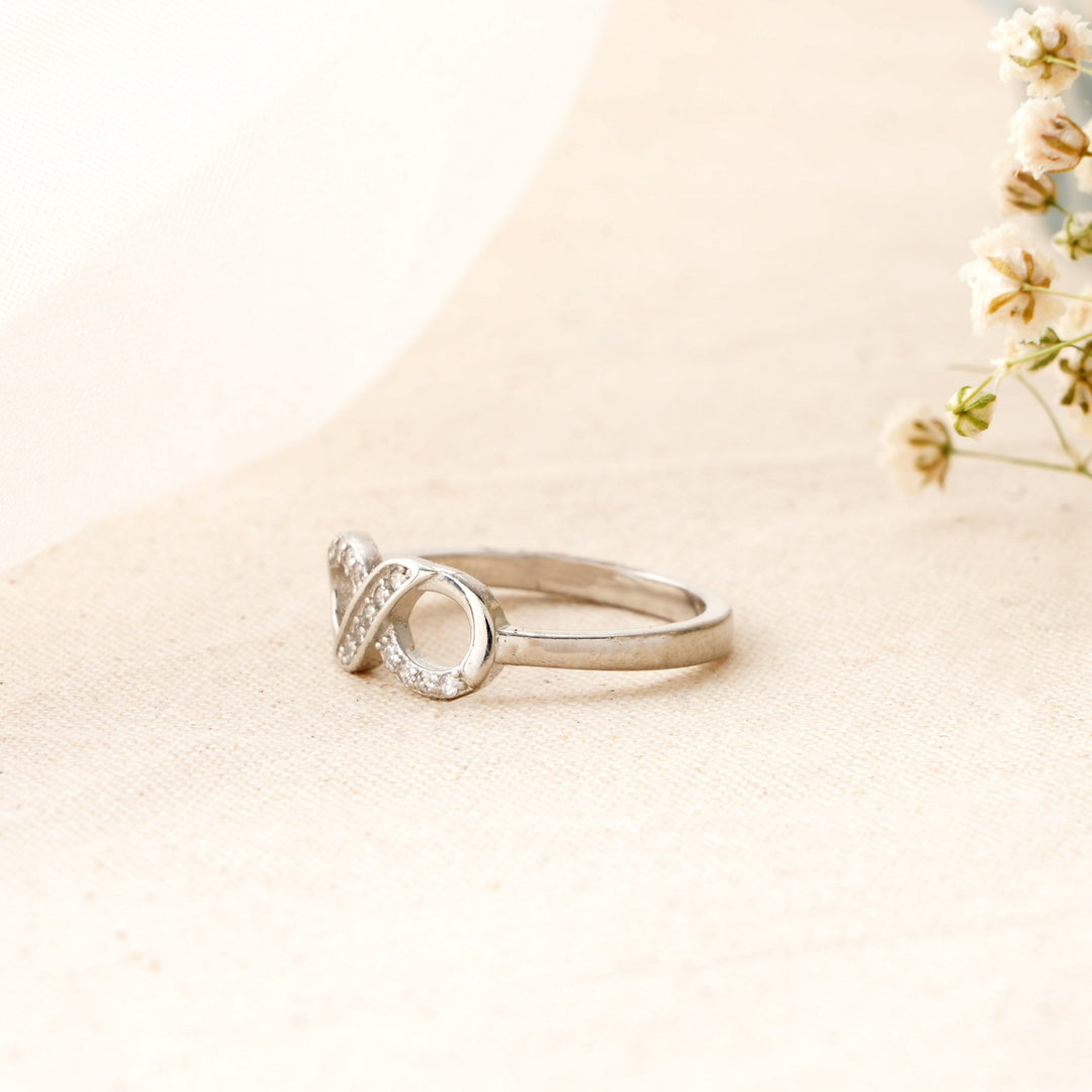 Elegant Infinity Ring with White Stone