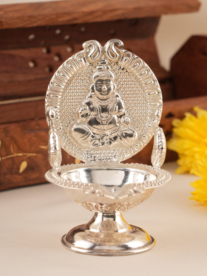 The Shape of Kubera in Silver Vilakku