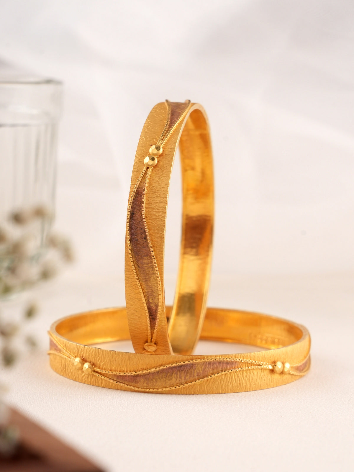Sleek Wavy Gold Bangle