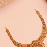 Gold Peacock Temple Necklace with Paisley Motif Chain and Ruby Green Stones