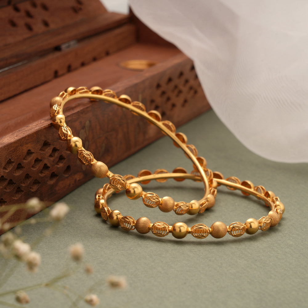 Textured Pattern with Gold Ball Bangles