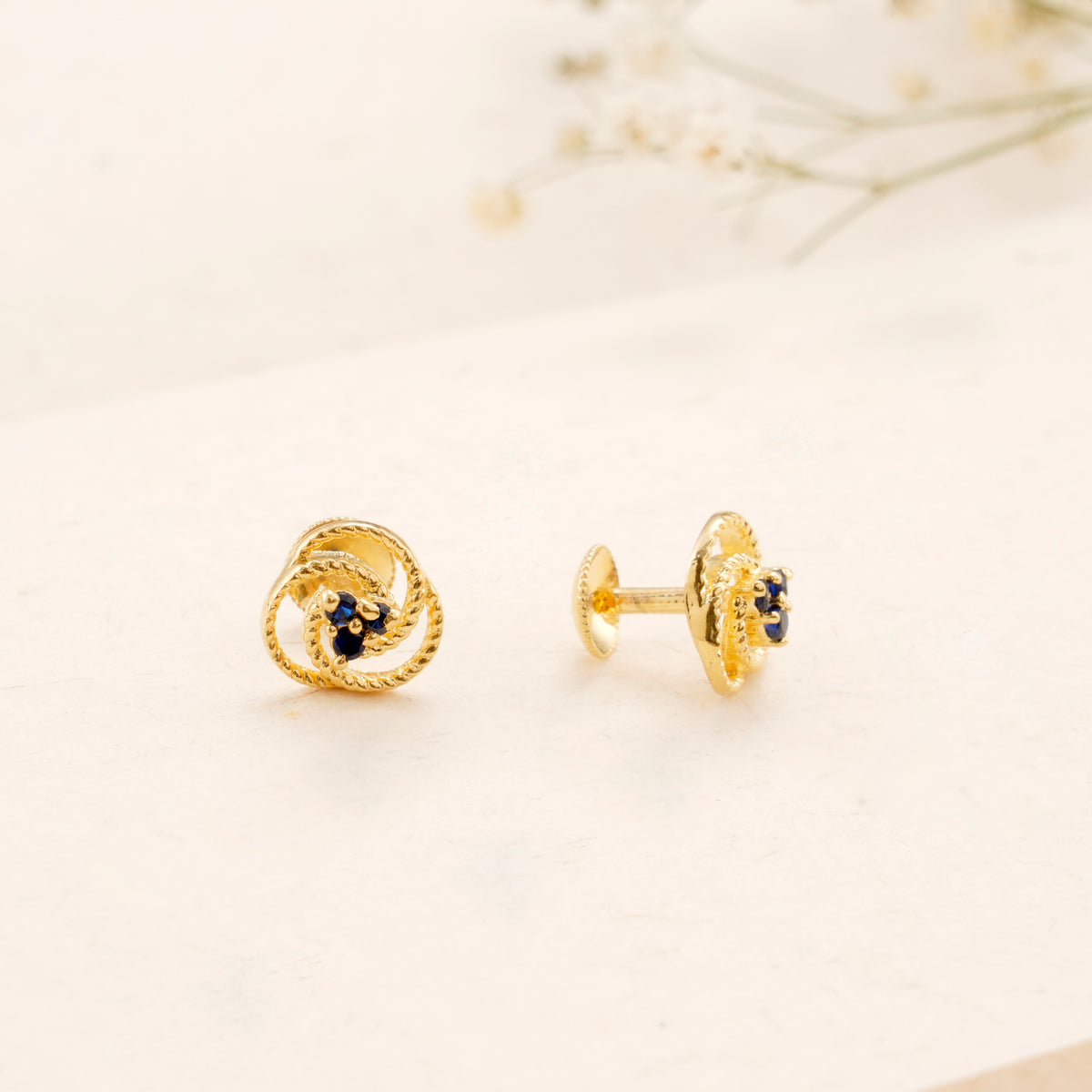 Twisted Rope Design Blue Stone Golden Stud