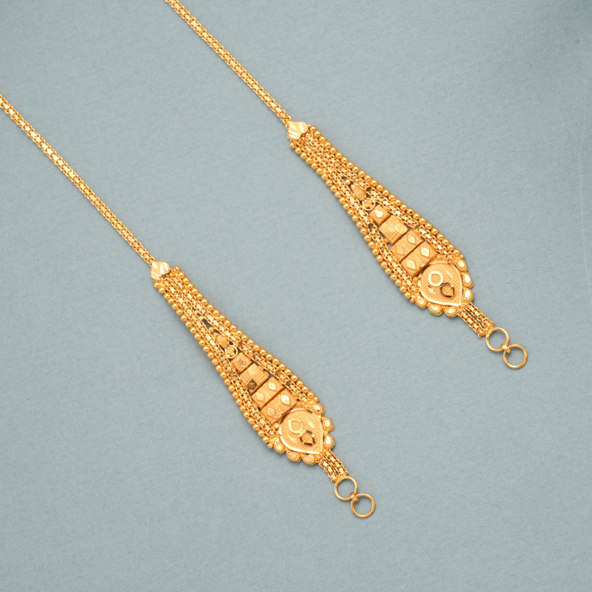 Gleaming Drop Design Gold Ear Mattal