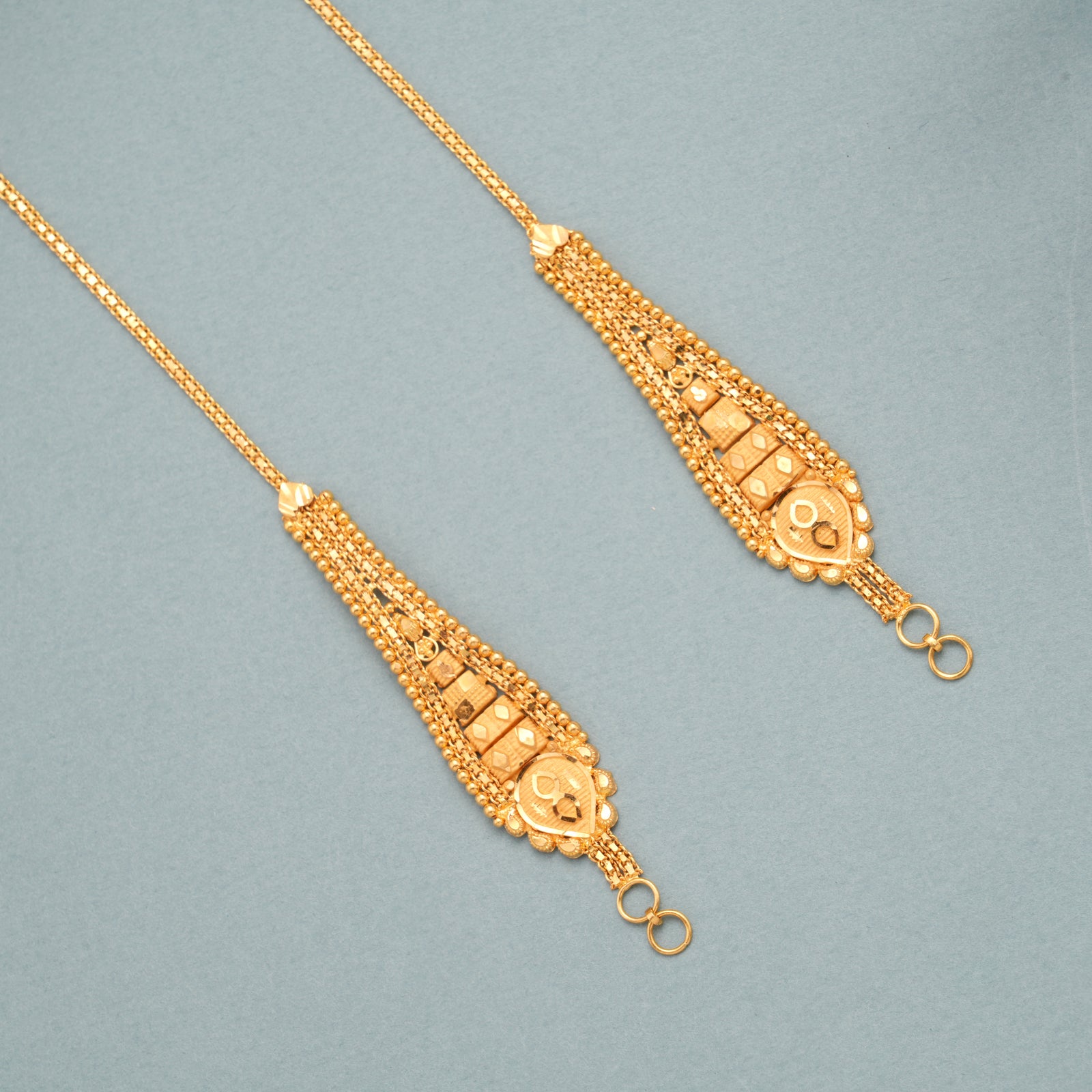 Gleaming Drop Design Gold Ear Mattal