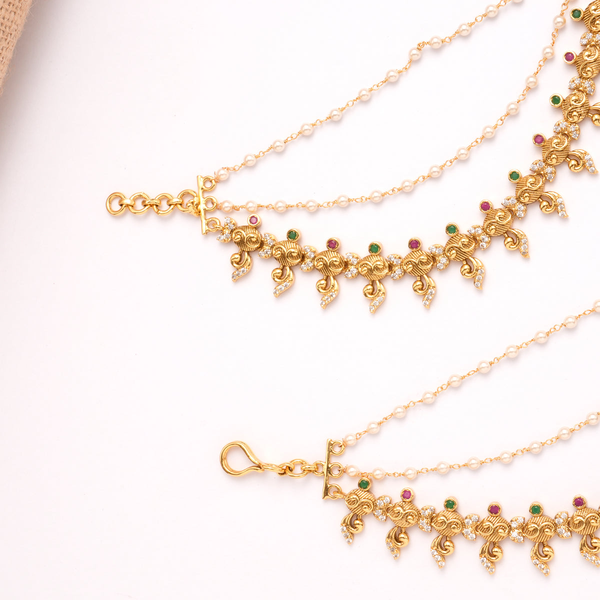 Regal Peacock Two Stone Pearl Layer Golden Mattal